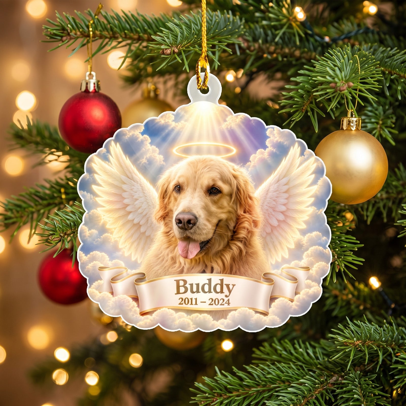 Personalized angel photo ornament hanging on a Christmas tree