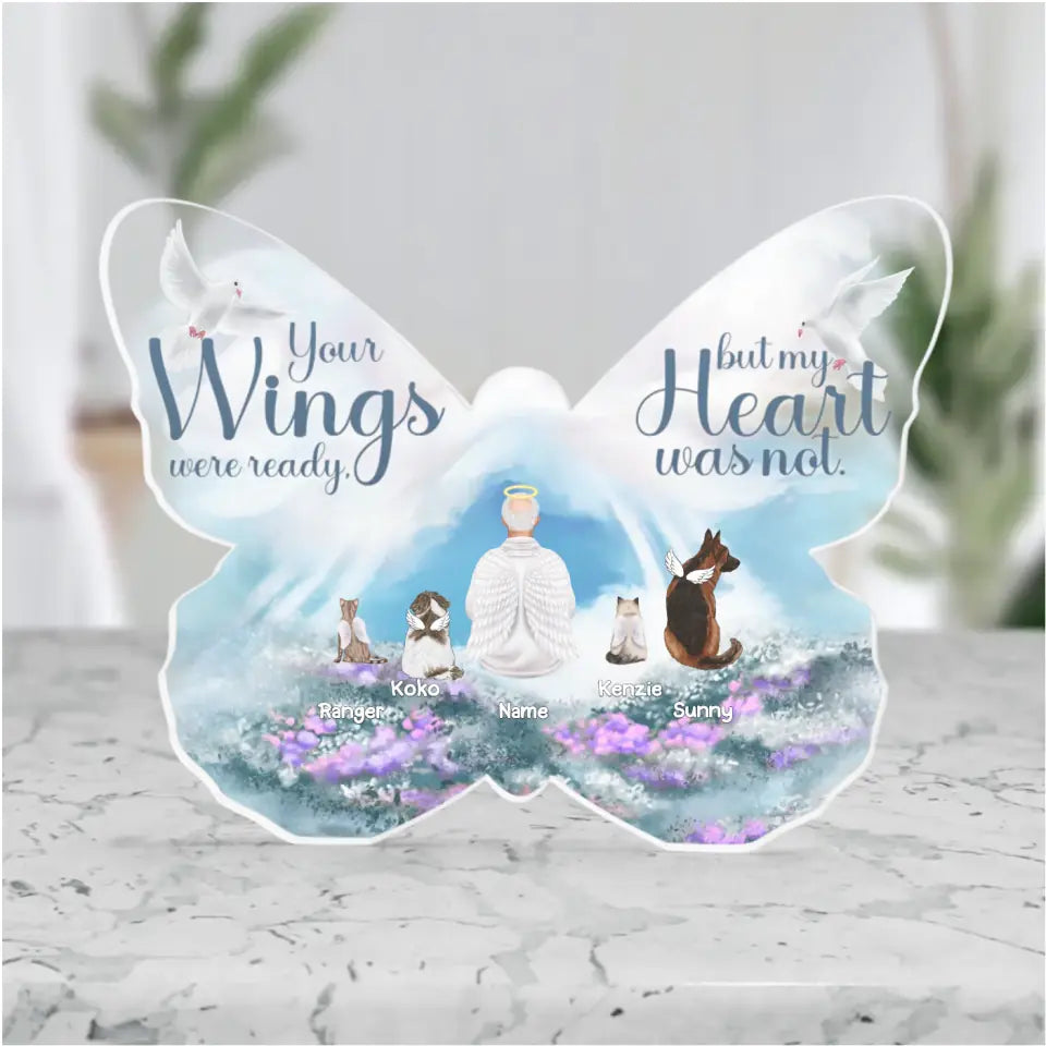 Gedenktafel mit Menschen und Haustieren